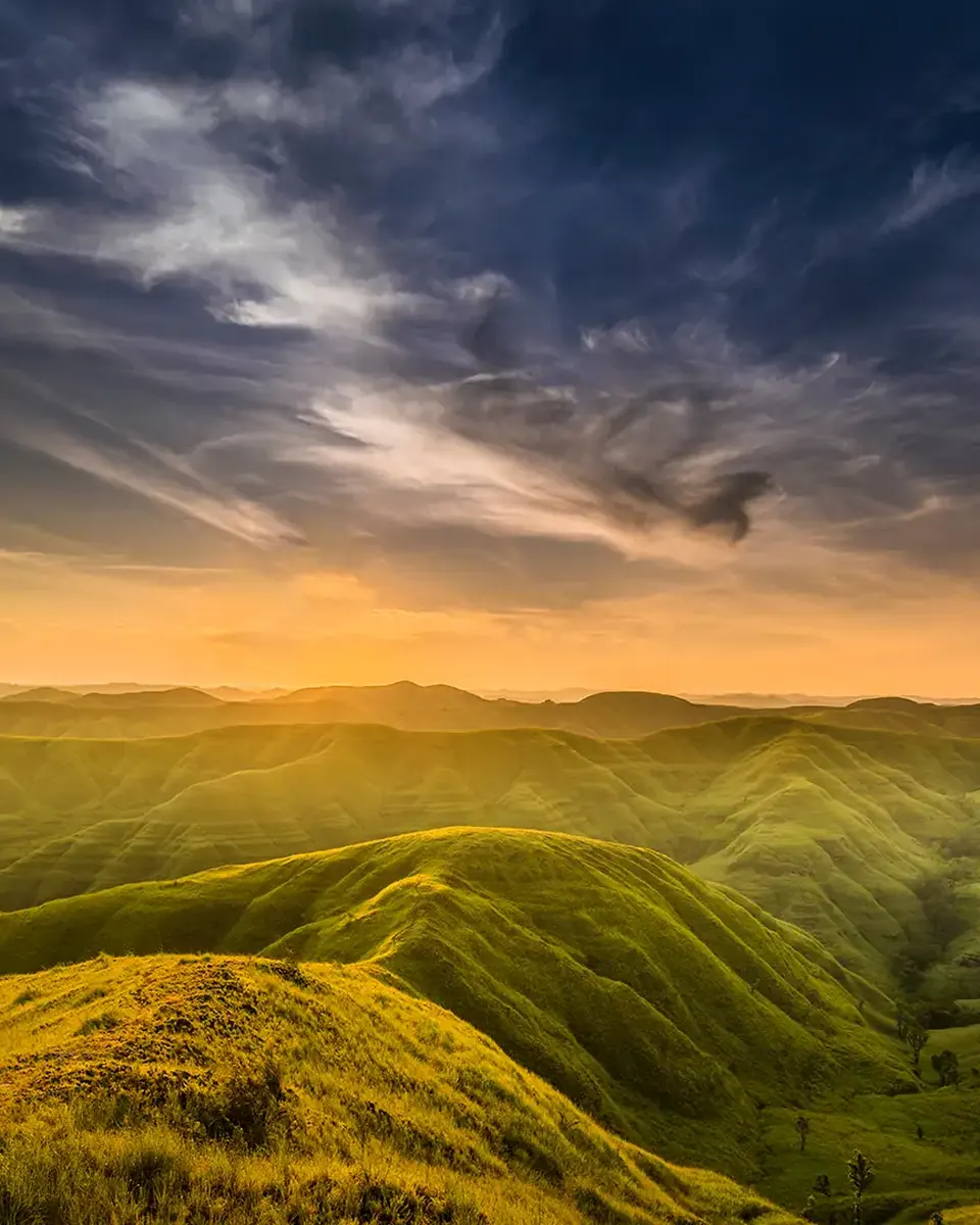 Sunset over the rolling hills of Warinding, East Sumba