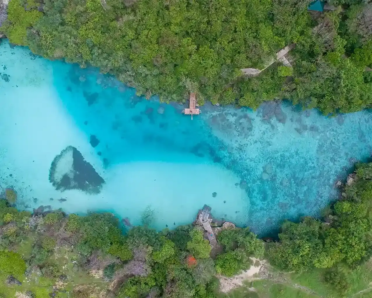 Aerial view of Weekuri Lagoon's turquoise water in Southwest Sumba