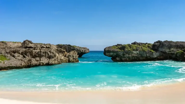 Turquoise water between the rock headlands of Mandorak Beach in Southwest Sumba