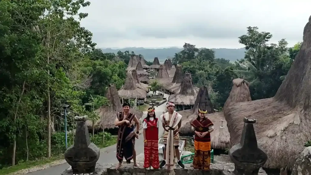 Travellers dressed in Sumbanese ikat at Prai Ijing traditional village