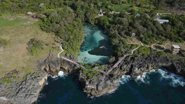 Aerial view of Weekuri Lagoon and its boardwalk on the coast of Southwest Sumba